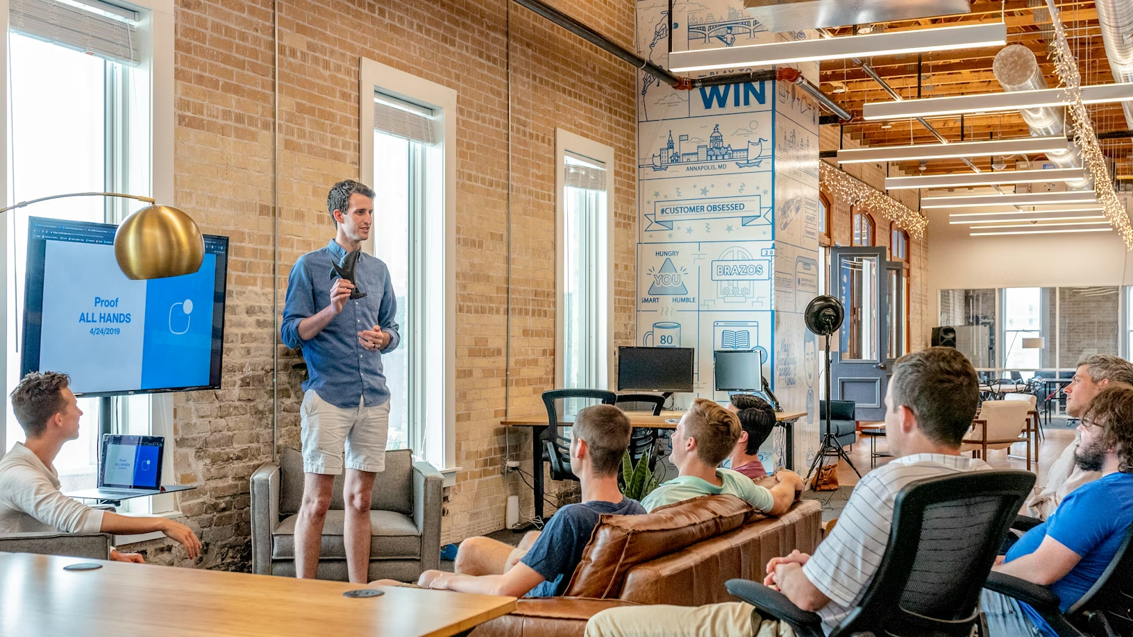 Professional leading an AI transformation presentation at work